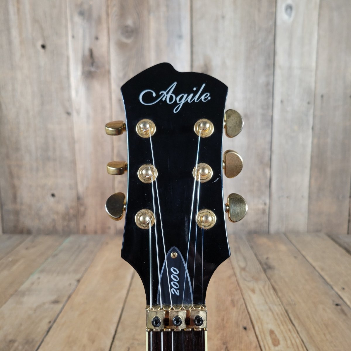 Agile AL - 2000 Les Paul Style Electric Guitar – Locking Tremolo System, Carved Top - Mahar's Vintage Guitars