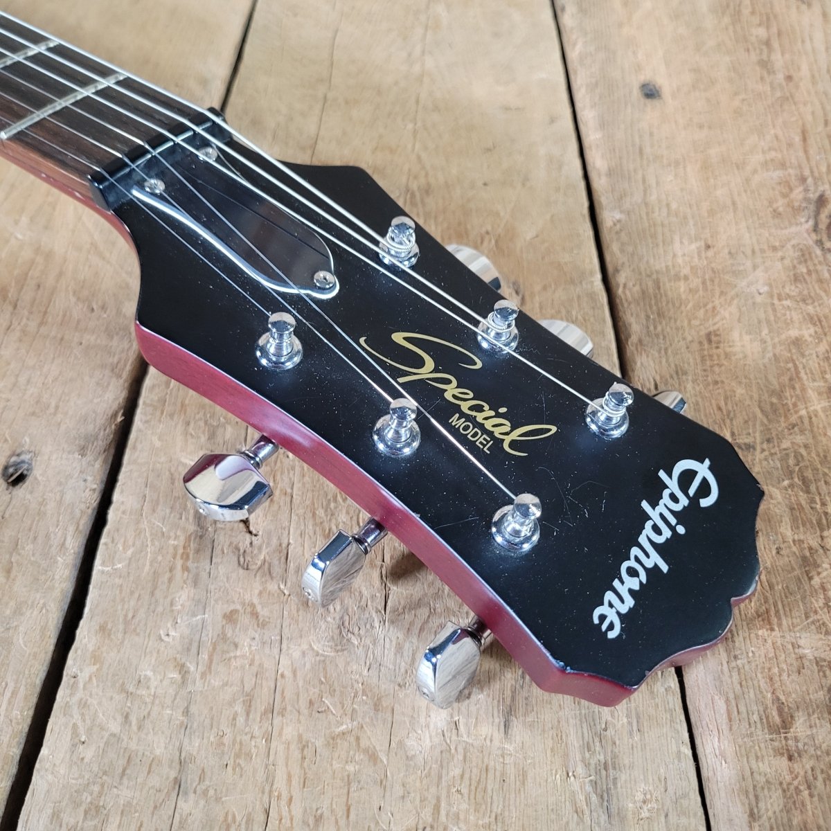 Epiphone Les Paul Special 2014 – Transparent Cherry, No Case - Mahar's Vintage Guitars
