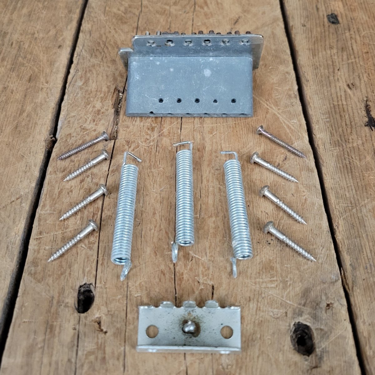 Fender Squier Stratocaster Tremolo Bridge with screws and springs 2000s - Mahar's Vintage Guitars