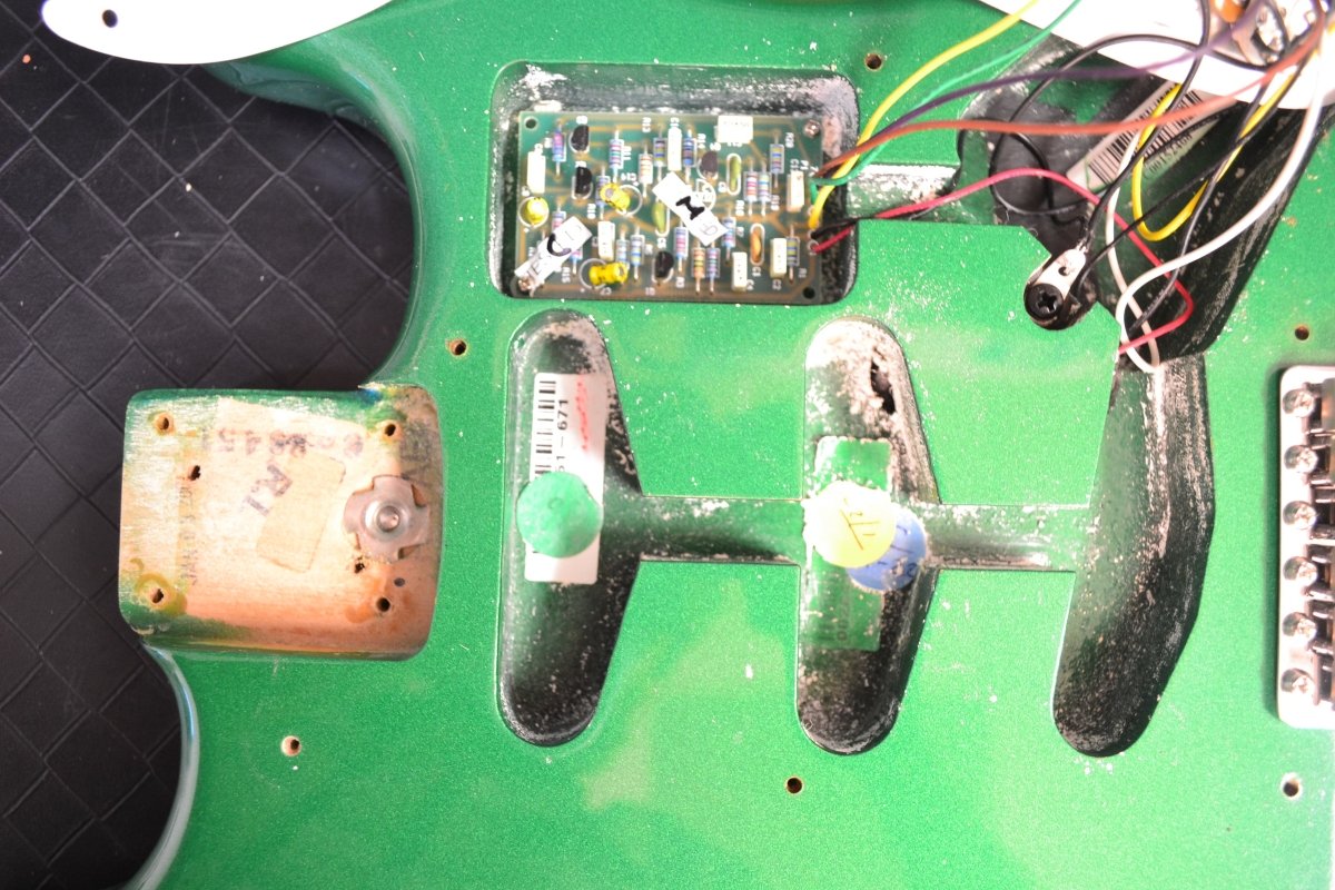 SOLD - Fender Stratocaster Eric Clapton Signature Metallic Green NOS 2006 - Mahar's Vintage Guitars