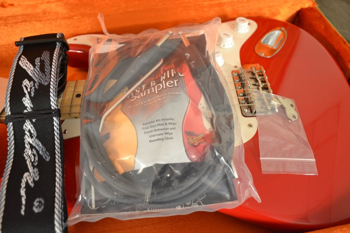 SOLD - Fender Stratocaster Eric Clapton Signature Torino Red MINT NOS 2004 - Mahar's Vintage Guitars