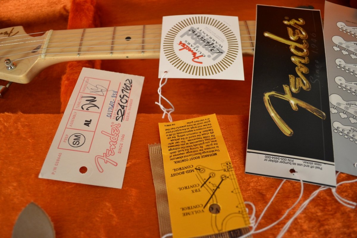 SOLD - Fender Stratocaster Eric Clapton Signature Torino Red MINT NOS 2004 - Mahar's Vintage Guitars