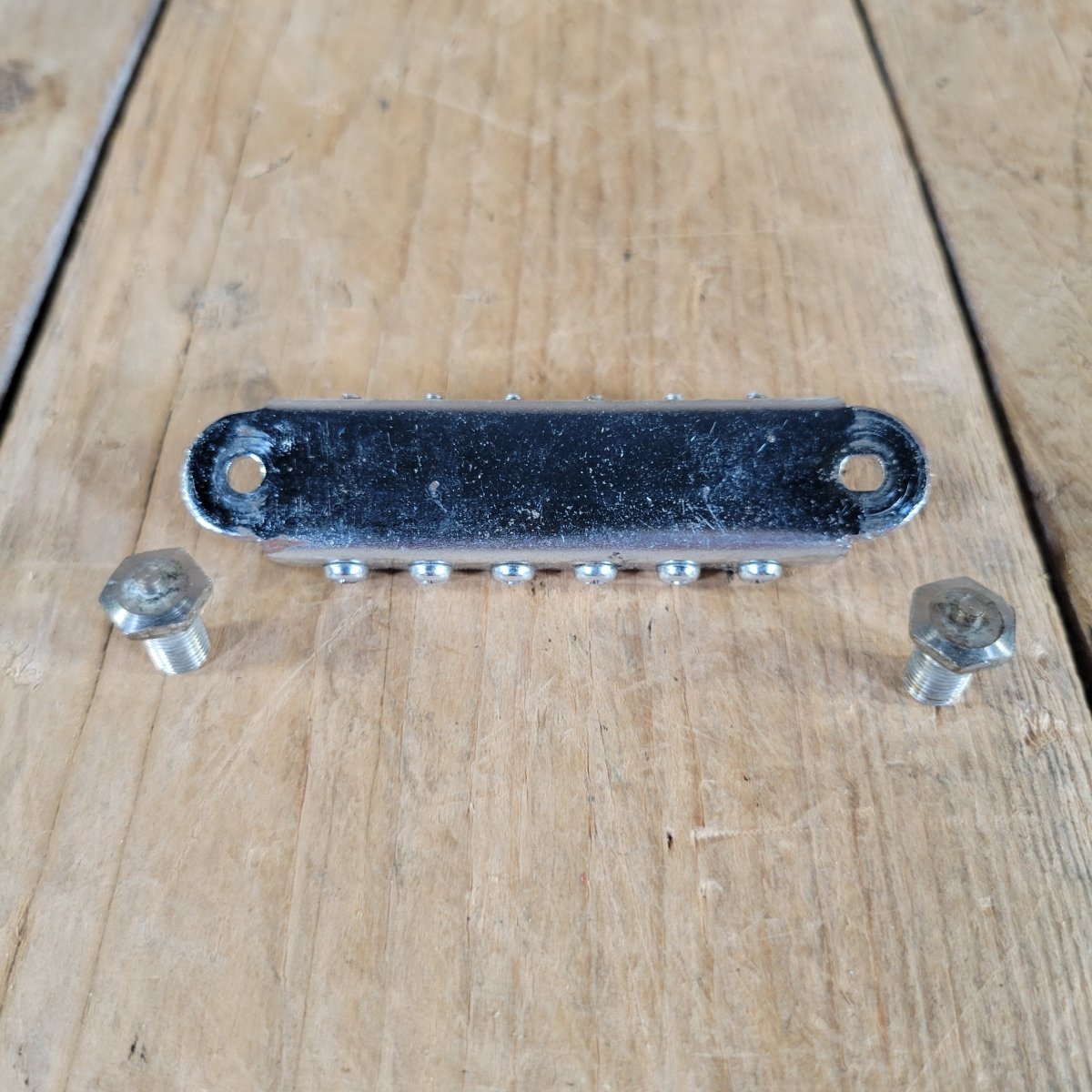 Harmony 1965 H17 Bobkat Replacement Bridge with Mounting Studs — Very Good - Mahar's Vintage Guitars