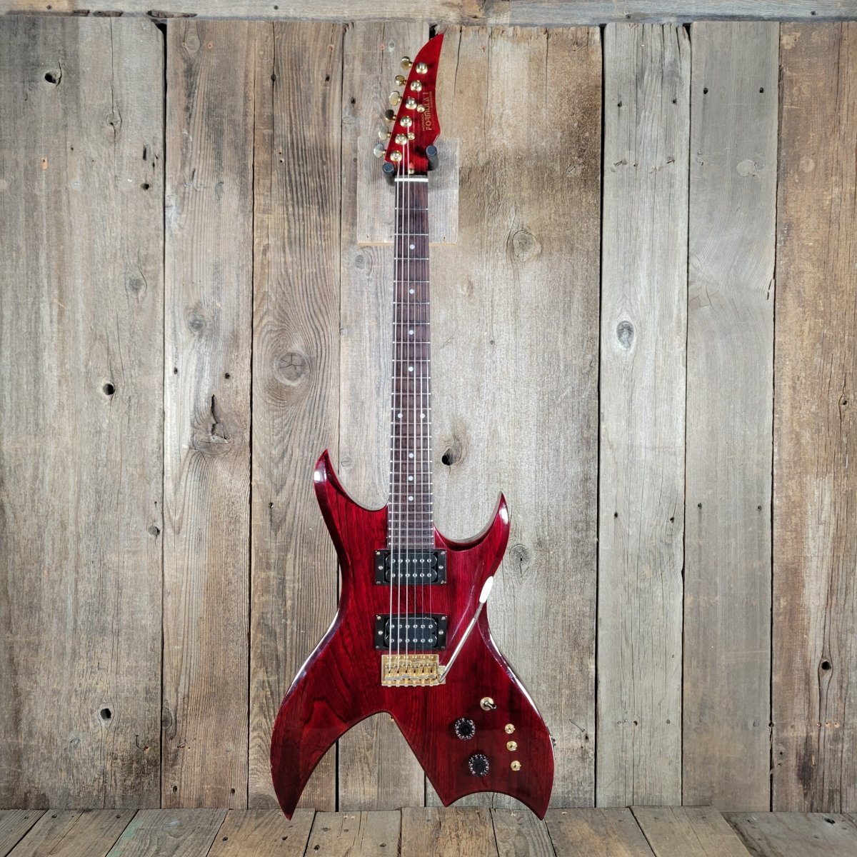 Hondo Formula 1 H - 785 Electric Guitar – 1980s Transparent Red, 24 - Fret Super Strat Style - Mahar's Vintage Guitars