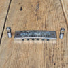 SOLD - Gibson "harmonica" guitar bridge with studs Les Paul Signature SG L6S 1970s - Mahar's Vintage Guitars