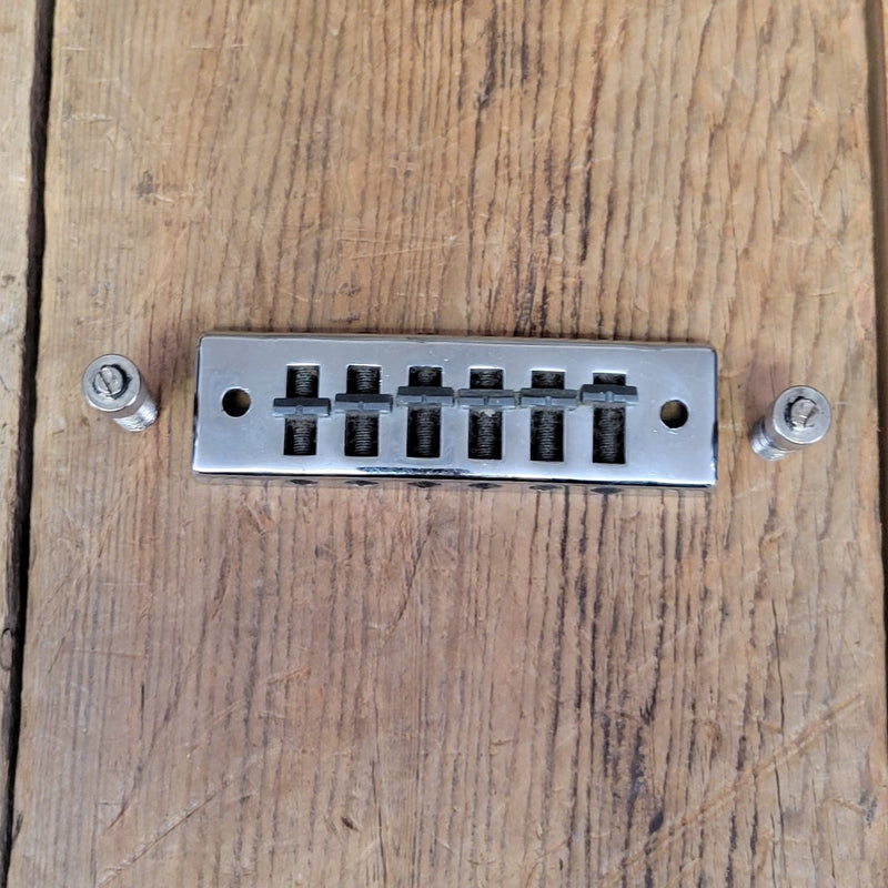 SOLD - Gibson "harmonica" guitar bridge with studs Les Paul Signature SG L6S 1970s - Mahar's Vintage Guitars
