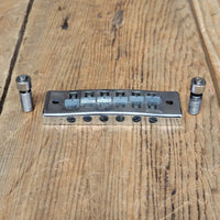 SOLD - Gibson "harmonica" guitar bridge with studs Les Paul Signature SG L6S 1970s - Mahar's Vintage Guitars