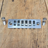 SOLD - Gibson "harmonica" guitar bridge with studs Les Paul Signature SG L6S 1970s - Mahar's Vintage Guitars